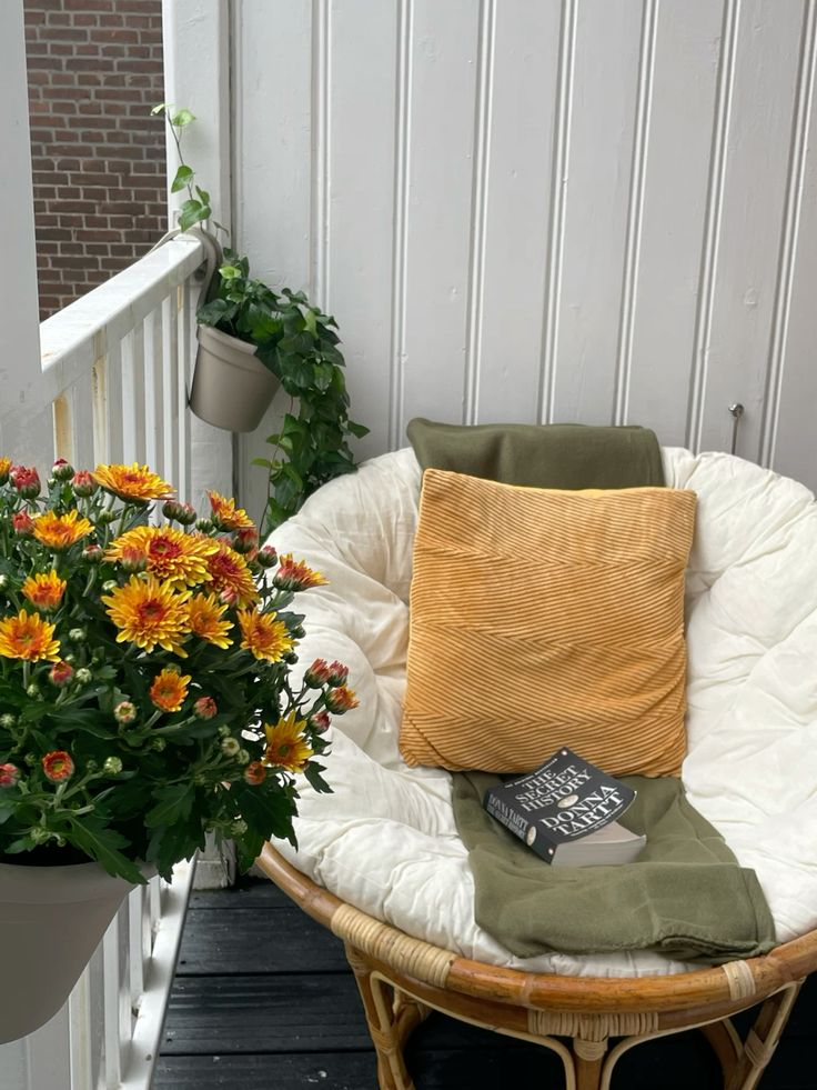 Cozy chair setup on balcony creating a relaxing reading nook